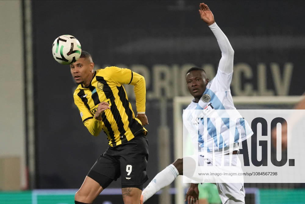 Ahmed Ankrah of Riga FC and Edmilson of Kairat compete for the ball during a UEFA Conference League soccer match between Latvias Riga FC and Kazakhstans Kairat Almaty at Skonto Stadium in Riga, Latvia, Thursday, Oct. 15, 2026. Riga Latvia