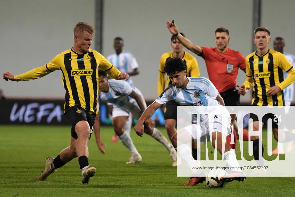 Salah Oulad M Hand of Riga FC and Jaakko Oksanen of Kairat compete for the ball during a UEFA Conference League soccer match between Latvias Riga FC and Kazakhstans Kairat Almaty at Skonto Stadium in Riga, Latvia, Thursday, Oct. 15, 2026. Riga Latvia