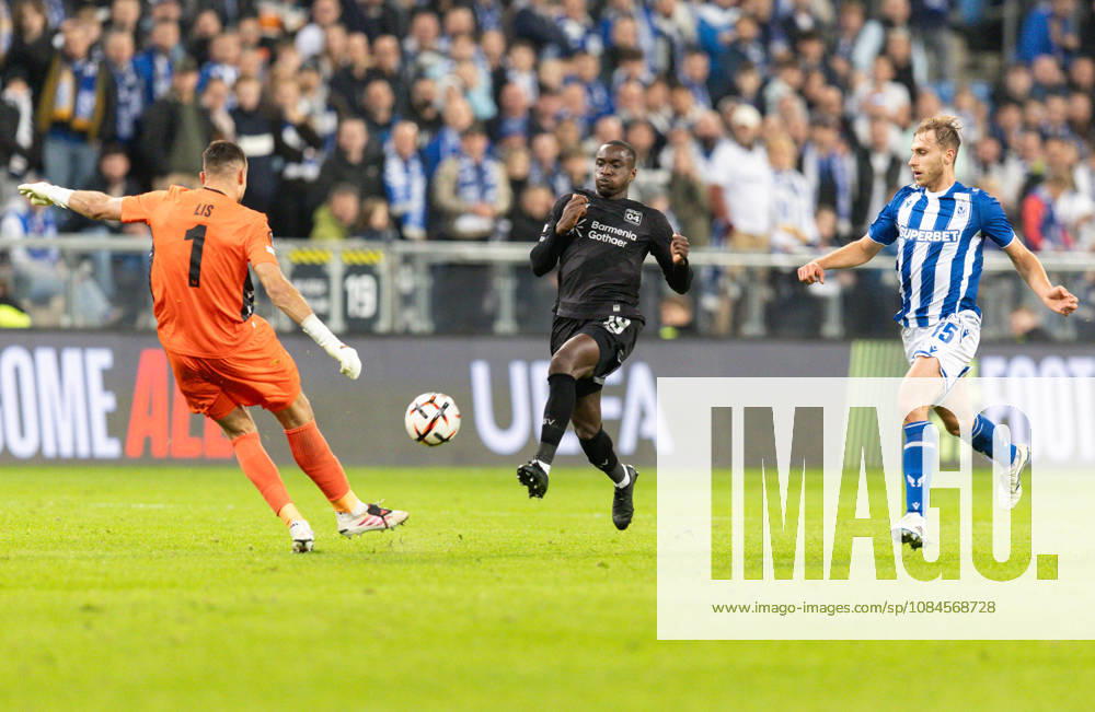 Europa League: Lech Poznan vs Bayer 04 Leverkusen Mateusz Lis, Moussa Diaby, Michal Gurgul during Europa League: Lech Poznan vs Bayer 04 Leverkusen match in Poznan, Poland, on October 15, 2026 Poznan Poland