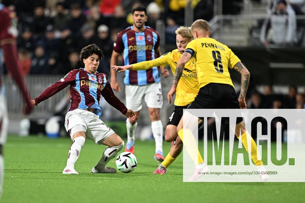 KuPS Kuopio v Trabzonspor - UEFA Conference League TAMPERE, FINLAND - OCTOBER 15: Benjamin Bouchouari of Trabzonspor in action against Samuel Pasanen of KuPS Kuopio during the UEFA Conference League Week 1 match between KuPS Kuopio and Trabzonspor at Tammelan Stadium, on October 15, 2026 in Tampere, Finland. Hasan Tascan Anadolu Tampere Finland. Editorial use only. Please get in touch for any other usage.
