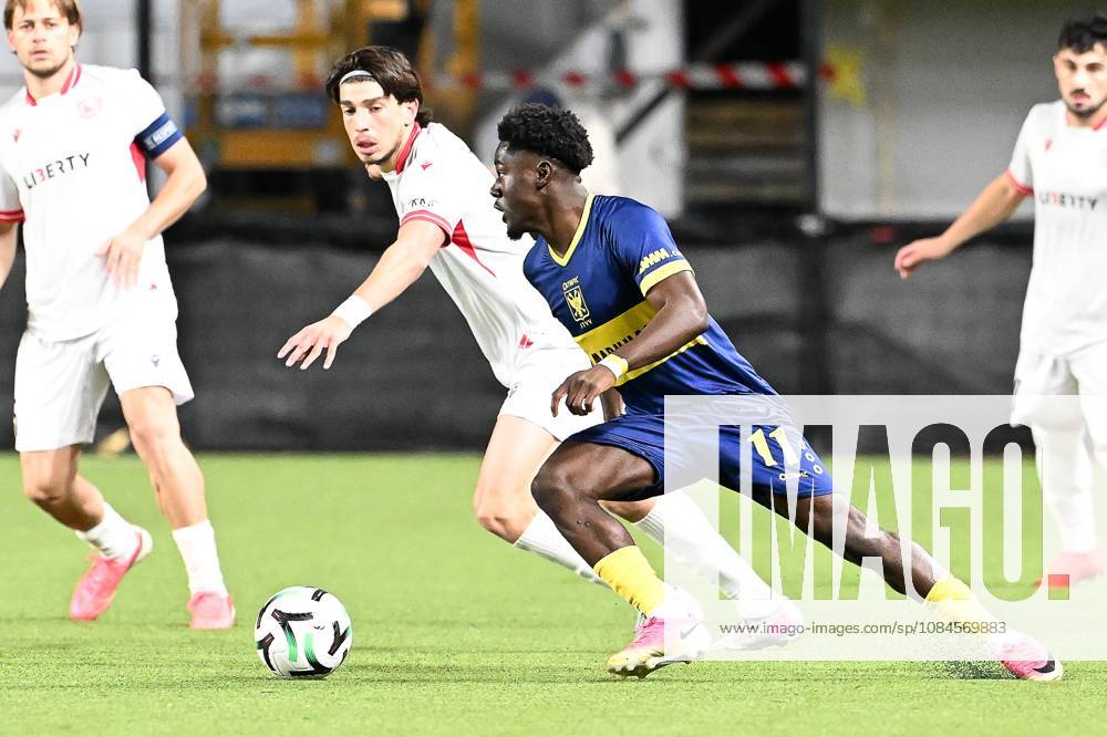 Iberia s Nikoloz Dadiani and STVV s Nathanael Mbuku pictured in action during a soccer game between Belgian Sint-Truidense VV and Georgian FC Iberia 1999 Tbilisi, Thursday 15 October 2026 in Sint-Truiden, the opening match of the UEFA Conference League league phase. JILLxDELSAUX x189927087x
