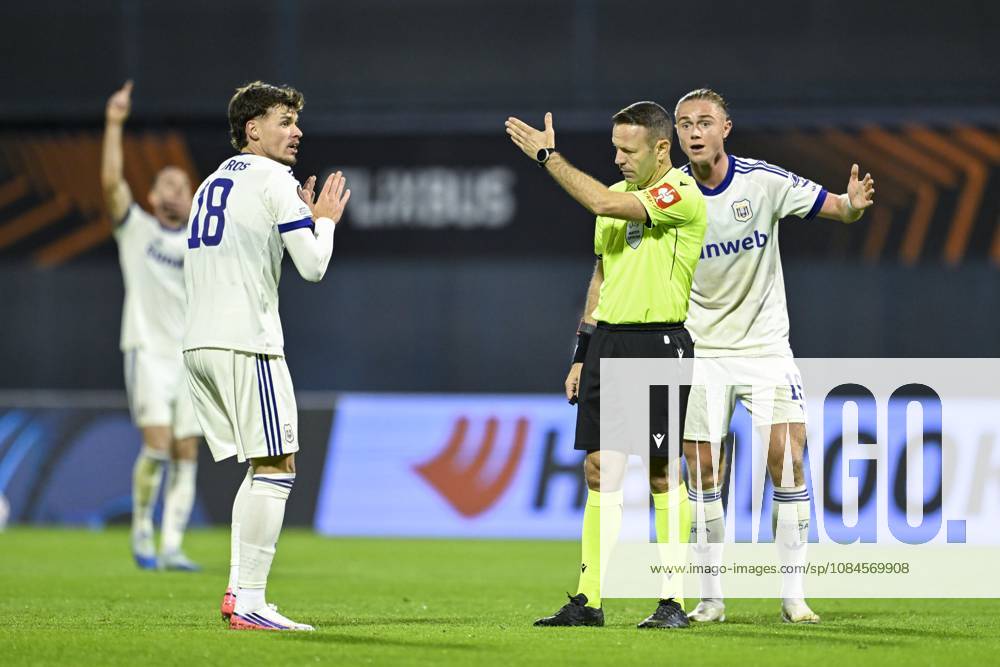 GNK Dinamo v RSC Anderlecht - UEFA Europa League ZAGREB, CROATIA - OCTOBER 15 : Ambros Lukas midfielder of RSC Anderlecht, Aasgaard Thelonious midfielder of RSC Anderlecht talking to referee during the UEFA Europa League 2026 27 League Phase matchday 2 match between GNK Dinamo and RSC Anderlecht on October 15, 2026 in Zagreb, Croatia, 15 10 2026 Zagreb Croatia