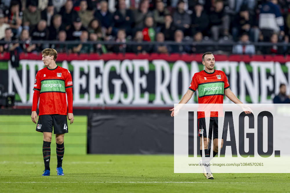 NIJMEGEN - (l-r) NEC Nijmegen defender Perr Schuurs and NEC Nijmegen midfielder Darko Nejaömic appear dejected during the UEFA Europa League match between N.E.C. and Levski Sofia at Stadion De Goffert on 15 October 2026 in Nijmegen, Netherlands. (Photo by DeFodi Images) -