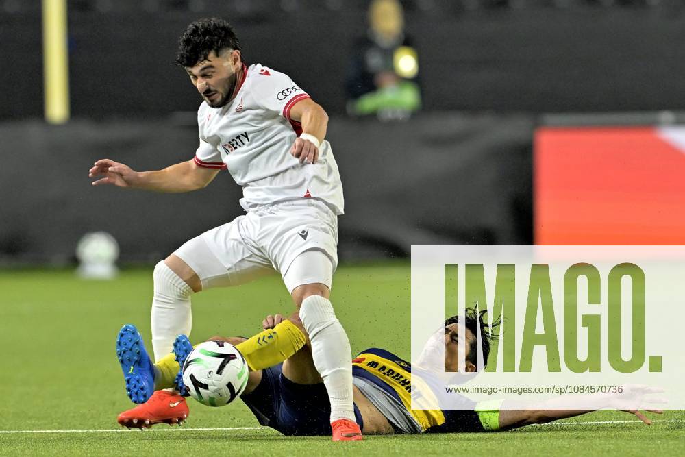 Sint-Truidense VV v Iberia Tbilisi - UEFA Conference League SINT-TRUIDEN, BELGIUM - OCTOBER 15 : Taniguchi Shogo defender of Sint-Truidense VV battles for the ball with Zviad Natchkhebia midfielder of FC Iberia 1999 Tbilisi during the UEFA Conference League 2026 27 first qualifying round between Sint-Truidense VV and Iberia Tbilisi on October 15, 2026 in Sint-Truiden, Belgium, 15 10 2026 Sint-Truiden Belgium