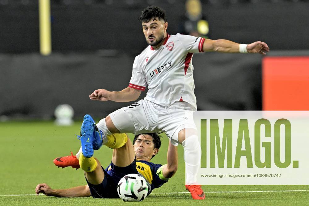 Sint-Truidense VV v Iberia Tbilisi - UEFA Conference League SINT-TRUIDEN, BELGIUM - OCTOBER 15 : Taniguchi Shogo defender of Sint-Truidense VV battles for the ball with Zviad Natchkhebia midfielder of FC Iberia 1999 Tbilisi during the UEFA Conference League 2026 27 first qualifying round between Sint-Truidense VV and Iberia Tbilisi on October 15, 2026 in Sint-Truiden, Belgium, 15 10 2026 Sint-Truiden Belgium