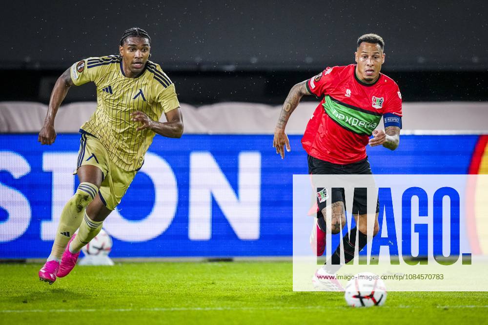 , Stadium De Goffert , season 2026 2027 , UEFA Europa League football , match between NEC Nijmegen and Levski Sofia , picture shows Levski Sofia player Christian Makoun and NEC Nijmegen player Tjaronn Chery NEC - Levski Sofia x208454752x