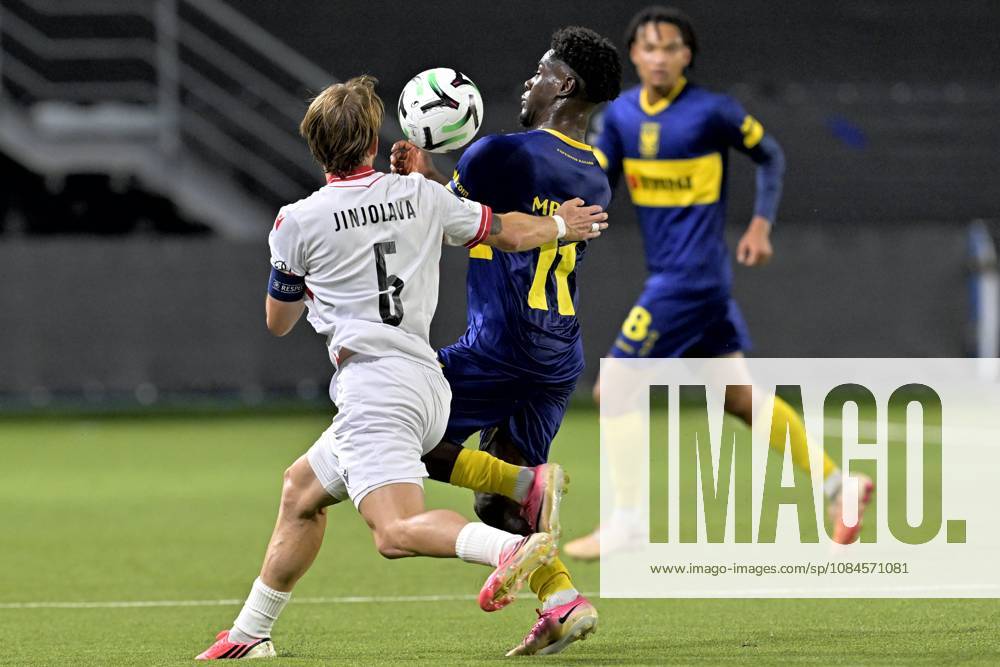 Sint-Truidense VV v Iberia Tbilisi - UEFA Conference League SINT-TRUIDEN, BELGIUM - OCTOBER 15 : Mbuku Nathanael forward of Sint-Truidense VV battles for the ball with Jemal-Giorgi Jinjolava defender of FC Iberia 1999 Tbilisi during the UEFA Conference League 2026 27 first qualifying round between Sint-Truidense VV and Iberia Tbilisi on October 15, 2026 in Sint-Truiden, Belgium, 15 10 2026 Sint-Truiden Belgium