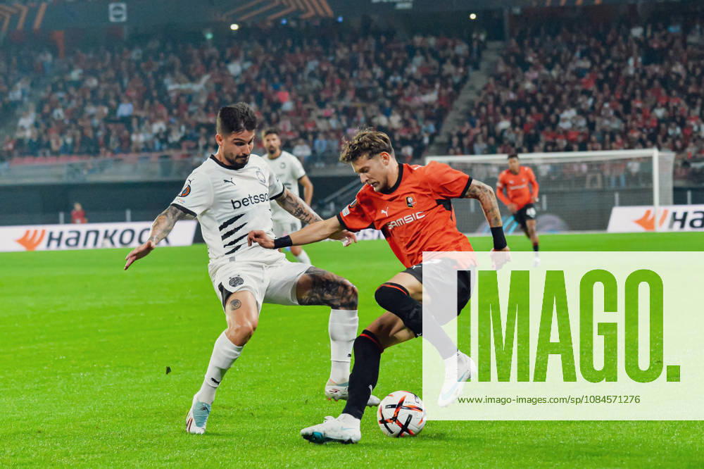 Taxiarchis Fountas (OFI Crete) Sebastian Szymanski (Stade Rennais)