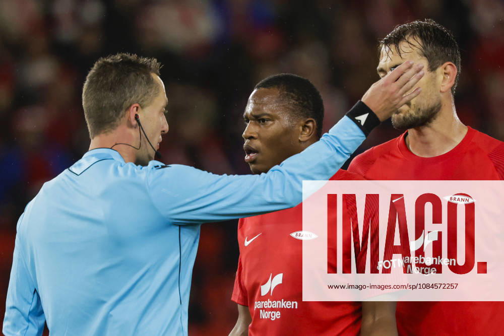Soccer, Conference League 2026 Brann Lincoln Red Imps Bergen 20261015 Referee Dalibor Äaerný shows a red card to Brann’s Neraysho Kasanwirjo alongside Fredrik Pallesen Knudsen during the Conference League soccer match between SK Brann and Lincoln Red Imps at Brann Stadium. Photo by Paul S. Amundsen, NTB, Bergen, Norway. . RESTRICTED USE FOR BETTING COMPANIES