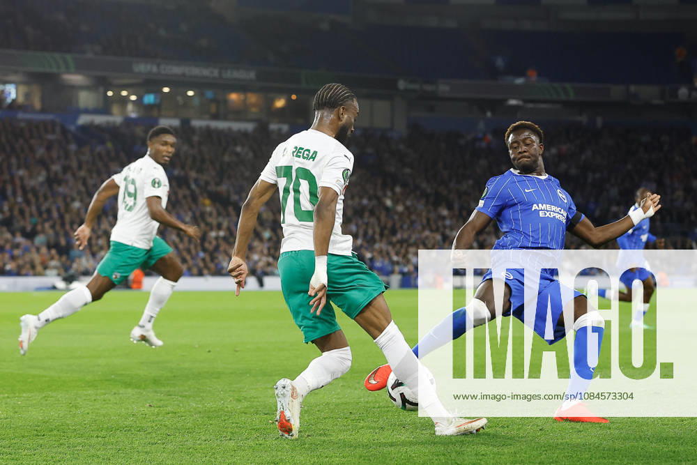 15th October 2026; American Express Stadium, Brighton, England; UEFA Conference League Football, Brighton and Hove Albion versus Kauno Zalgiris; Fabien Ourega of Kauno Zalgiris looking for Renan Oliveira of Kauno Zalgiris under huge pressure from Ibrahim Osman of Brighton and Hove Albion ChrisxRoll