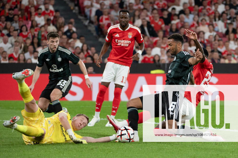 Celtic FC goalkeeper VILJAMI SINISALO dives low to reach the ball amid a goalmouth challenge during the UEFA Europa League league phase matchday two game against SL Benfica at Estadio da Luz in Lisbon, Portugal, on October 15, 2026. SL Benfica V Celtic FC - UEFA Europa League, Lisbon, Portugal - ZUMAr238 20261015_zip_r238_014