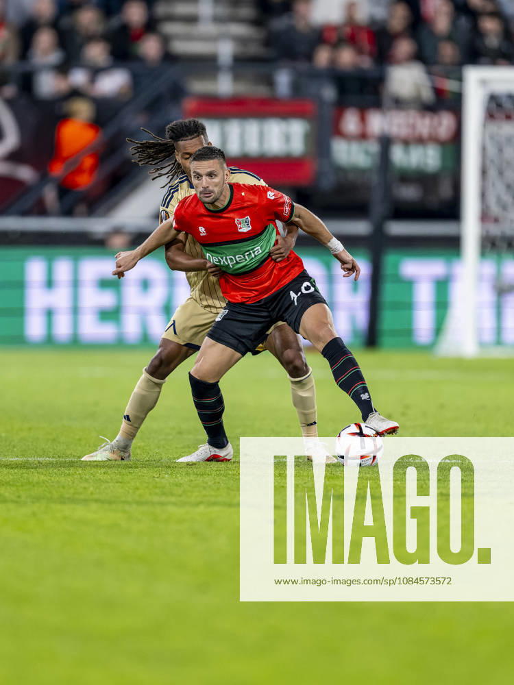 NIJMEGEN - Levski Sofia midfielder Mehdi Moubarik and NEC Nijmegen forward Duöan Tadic during the UEFA Europa League match between N.E.C. and Levski Sofia at Stadion De Goffert on 15 October 2026 in Nijmegen, Nederland. (Photo by DeFodi Images) -