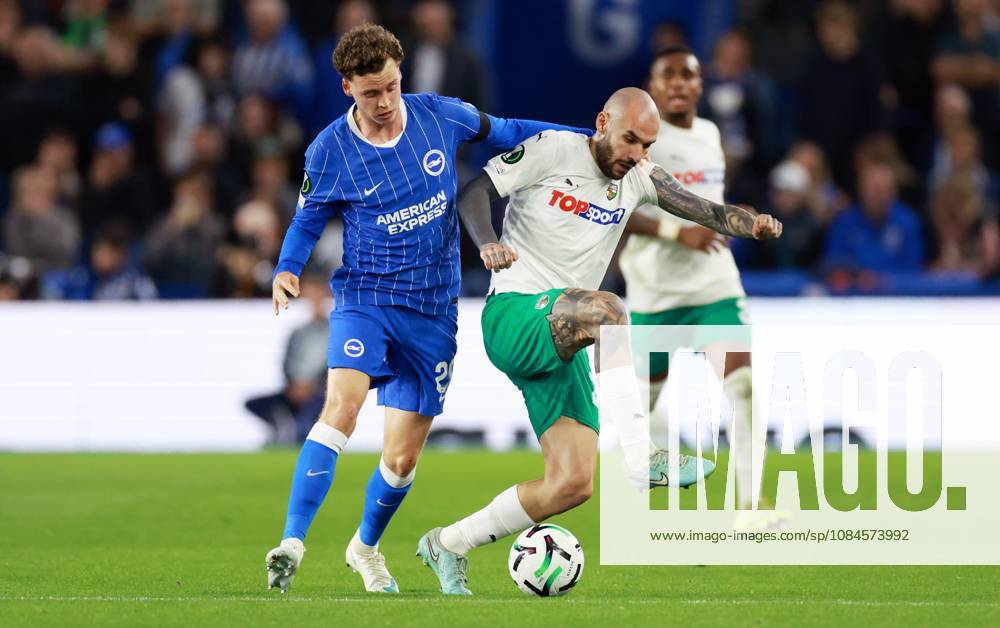 Maxim De Cuyper of Brighton and Hove Albion and Anthony Kalik of Kauno Zalgiris. Brighton & Hove Albion v Kauno Zalgiris, UEFA Conference League, Football, American Express Stadium, Brighton, UK - 15 Oct 2026Brighton American Express Stadium United Kingdom