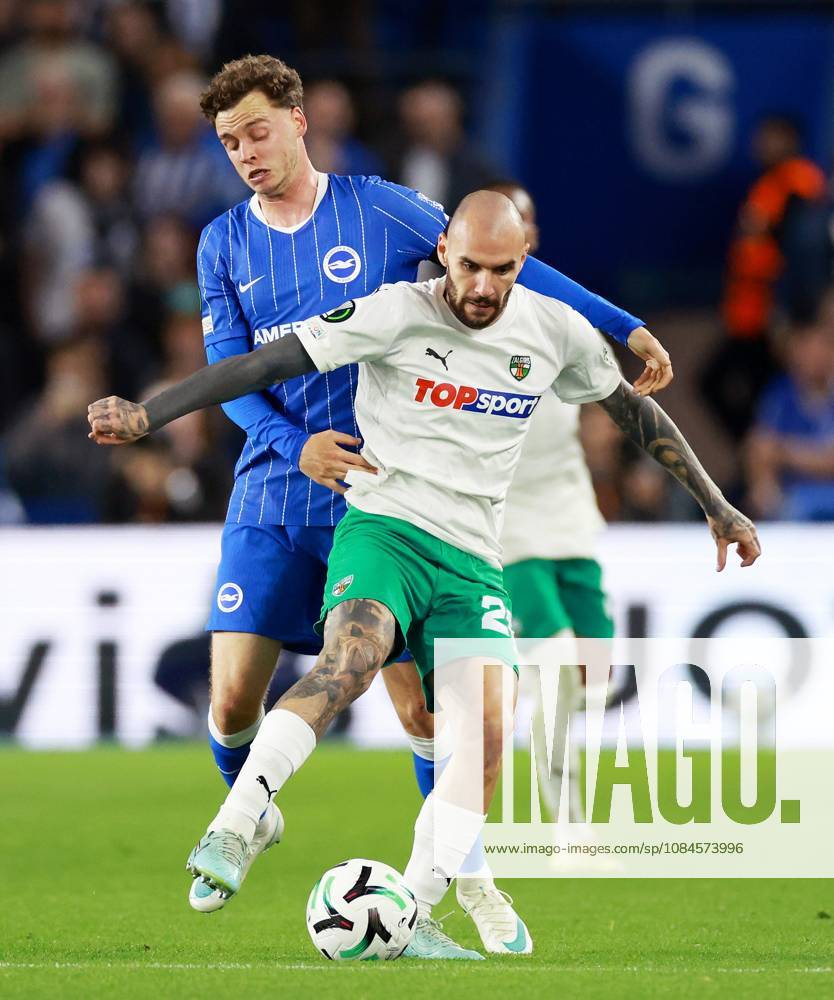 Maxim De Cuyper of Brighton and Hove Albion and Anthony Kalik of Kauno Zalgiris. Brighton & Hove Albion v Kauno Zalgiris, UEFA Conference League, Football, American Express Stadium, Brighton, UK - 15 Oct 2026Brighton American Express Stadium United Kingdom