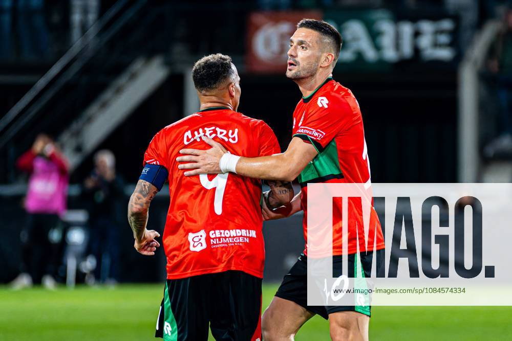 NIJMEGEN - Tjaronn Chery of NEC Nijmegen celebrates his team s first goal with Dusan Tadic of NEC Nijmegen during the UEFA Europa League match between NEC Nijmegen and Levski Sofia at the Goffertstadion on October 15, 2026, in Nijmegen, the Netherlands. KEVIN SENDERS ANP UEFA Europa League 2026 27 ANPxSportx xMarcelxterxBalsxIVx 572559736 originalFilename: 572559736