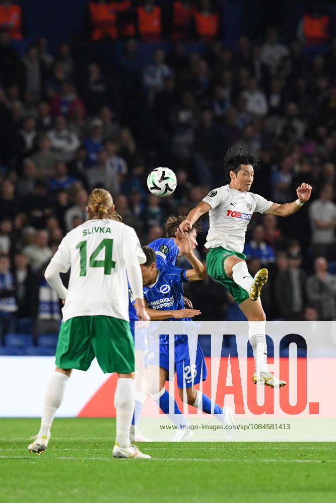 Brighton and Hove Albion v Kauno Zalgiris, UEFA Conference League Yukiyoshi Karashima of Kauno Zalgiris jumps above Yasin Ayari Midfielder of Brighton and Hove Albion to win the ball during the UEFA Conference League match between Brighton and Hove Albion and Kauno Zalgiris at the American Express Stadium, Brighton and Hove, UK on 15 October 2026. Brighton and Hove American Express Stadium East Sussex UK Editorial use only ,