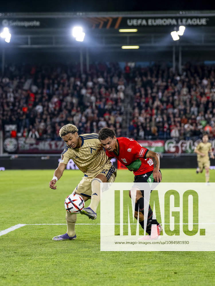 NIJMEGEN - (l-r) Levski Sofia forward Armstrong Oko-Flex and NEC Nijmegen defender Deveron Fonville during the UEFA Europa League match between N.E.C. and Levski Sofia at Stadion De Goffert on 15 October 2026 in Nijmegen, Netherlands. (Photo by DeFodi Images) -