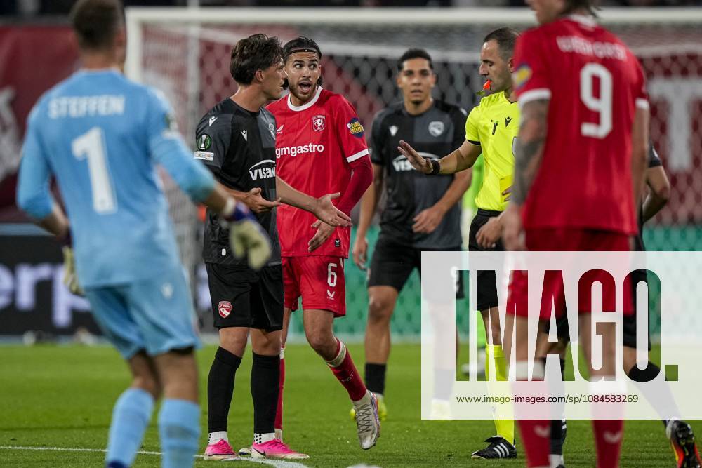 ENSCHEDE - (lr) Ramiz Zerrouki of FC Twente, Referee Genc Nuza during the Conference League match between FC Twente and FC Thun at De Grolsch Veste stadium on 15 October 2026 in Enschede, the Netherlands. TOBIAS KLEUVER ANP ANPxSportx IVx 572581220 originalFilename: 572581220
