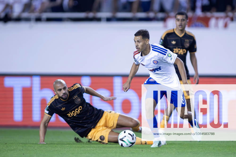Khalil Fayade (HNK HAjduk) 8 and Sofyan Amrabat (AFC Ajax) 4 in action during he UEFA Conference League match between HNK Hajduk Split (CRO) and AFC Ajax Amsterdam (NL) at Poljud Stadium. Split Croatia - ZUMAp210 20261015_zsp_p210_039