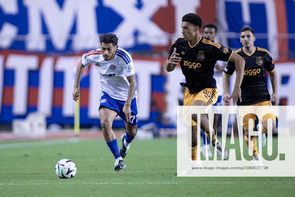 Carlos Martin (HNK HAjduk) 77 and Aaron Bouwman (AFC Ajax) 30 in action during the UEFA Conference League match between HNK Hajduk Split (CRO) and AFC Ajax Amsterdam (NL) at Poljud Stadium. Split Croatia - ZUMAp210 20261015_zsp_p210_047