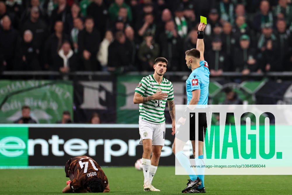 (261016) -- BUDAPEST, Oct. 16, 2026 -- Referee Damian Sylwestrzak (R) gives Attila Osvath (C) of Ferencvaros a yellow card during the UEFA Europa League 2026 27 League Phase match between Ferencvaros and Viktoria Plzen in Budapest, Hungary, Oct. 15, 2026. ) (SP)HUNGARY-BUDAPEST-FOOTBALL-UEFA EUROPA LEAGUE-FERENCVAROS VS VIKTORIA PLZEN HuxZhixuan