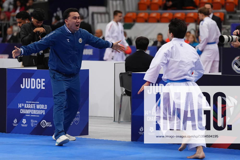 2026 World Cadet, Junior & U21, U 21 Karate Championships BIELSKO-BIALA, POLAND - OCTOBER 16: Javokhir Djakhangirov of Uzbekistan celebrates victory with his coach after winning the cadet male individual kata semi-final at the 2026 World Cadet, Junior & U21 Karate Championships at Hala Pod Debowcem on October 16, 2026 in Bielsko-Biala, Poland. Bielsko-Biala Hala Pod Debowcem Poland