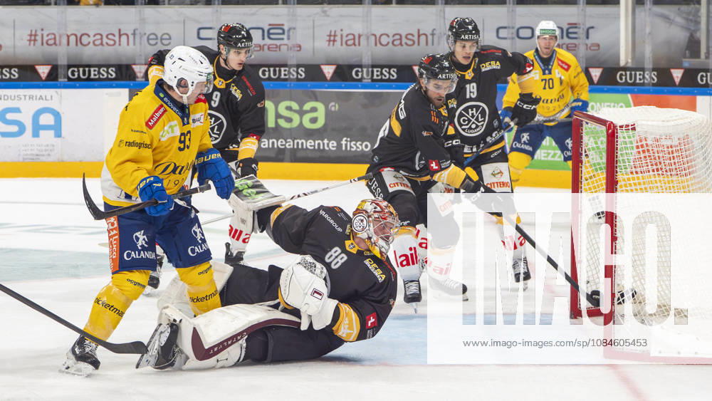 goalkeeper Robert Mayer of Lugano cant saves on Frederic Allard of Davos not showed) during the game between HC Lugano v HC Davos at the Corner Arena on October 16, 2026 in Lugano, Switzerland. Lugano Ticino Switzerland