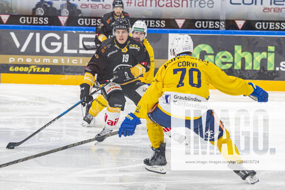 Rasmus Kupari of Lugano L) against Enzo Corvi of Davos R) during the game between HC Lugano v HC Davos at the Corner Arena on October 16, 2026 in Lugano, Switzerland. Lugano Ticino Switzerland