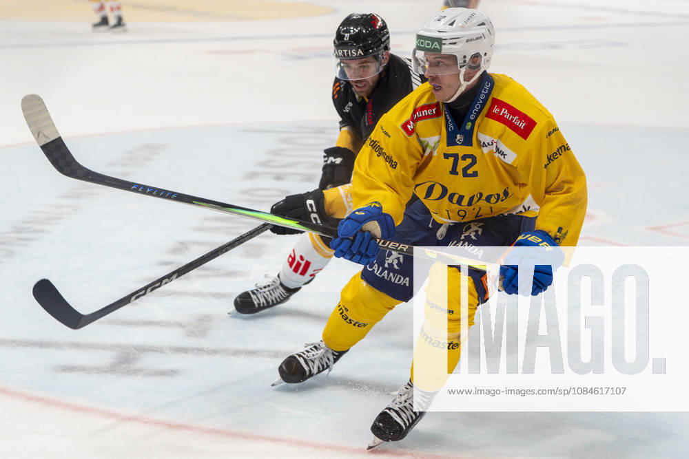 Tino Kessler of Davos R) against Zach Sanford of Lugano L) during the game between HC Lugano v HC Davos at the Corner Arena on October 16, 2026 in Lugano, Switzerland. Lugano Ticino Switzerland