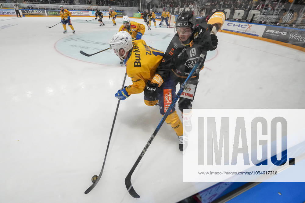 Filip Zadina of Davos L) against Rasmus Kupari of Lugano R) during the game between HC Lugano v HC Davos at the Corner Arena on October 16, 2026 in Lugano, Switzerland. Lugano Ticino Switzerland
