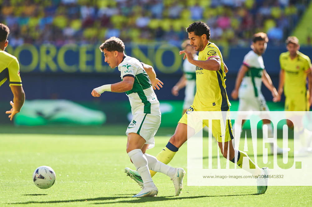 German Valera (Elche CF) and Ayoze Perez (Villarreal CF) during the LaLiga EA Sports match between Villarreal CF and Elche CF at Estadio de la Cerámica on October 17, 2026 in Villarreal, Spain. -