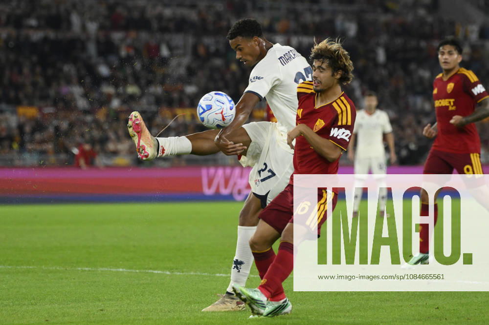 Genoa’s Alessandro Marcandalli fights for the ball with Roma’s Rodrigo Mora during the Serie A Enilive soccer match between AS Roma and Genoa at the Rome s Olympic stadium, Italy - October 17, 2026. - Soccer.
