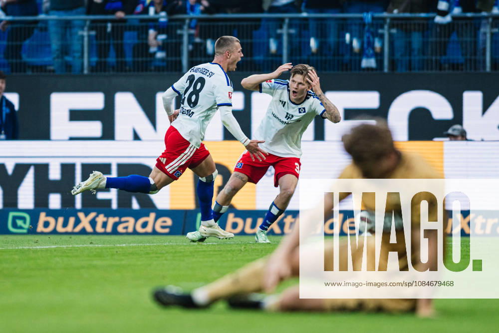 1. Bundesliga: Hamburger SV vs. VfB Stuttgart, 17.10.2026 TOR, JUBEL zum 1:0 durch Miro Muheim (Hamburger SV, 28), David Moller Wolfe (Hamburger SV, 3) kann es nicht fassen, im Vordergrund liegt ein VfB Stuttgart Spieler ; Fußball, 1. Bundesliga, 6. Spieltag: Hamburger SV vs. VfB Stuttgart am 17.10.2026 im Volksparkstadion, Hamburg DFL REGULATIONS PROHIBIT ANY USE OF PHOTOGRAPHS AS IMAGE SEQUENCES AND OR QUASI-VIDEO.