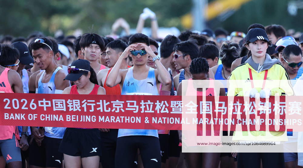 (261018) -- BEIJING, Oct. 18, 2026 -- Runners prepare before the 2026 Beijing Marathon & National Marathon Championships in Beijing, capital of China, Oct. 18, 2026. ) (SP)CHINA-BEIJING-2026 BEIJING MARATHON(CN) LixMing