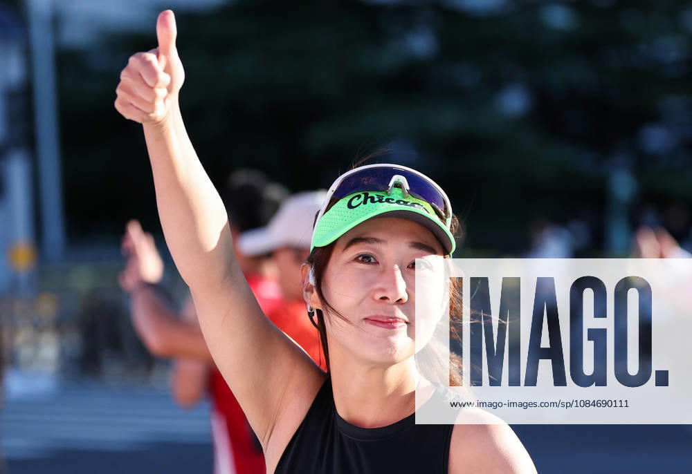 (261018) -- BEIJING, Oct. 18, 2026 -- A runner gestures as she competes during the 2026 Beijing Marathon & National Marathon Championships in Beijing, capital of China, Oct. 18, 2026. ) (SP)CHINA-BEIJING-2026 BEIJING MARATHON(CN) LixMing