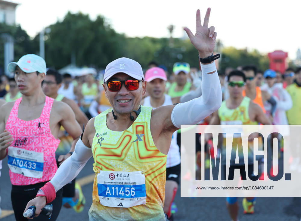 (261018) -- BEIJING, Oct. 18, 2026 -- A runner gestures as he competes during the 2026 Beijing Marathon & National Marathon Championships in Beijing, capital of China, Oct. 18, 2026. ) (SP)CHINA-BEIJING-2026 BEIJING MARATHON JinxLiwang