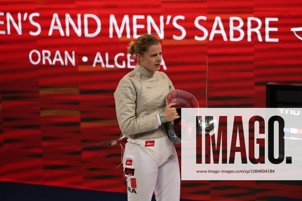 FIE Fencing World Cup in Algeria ORAN, ALGERIA - OCTOBER 18: French fencer Toscane Tori holds her mask and sabre following the women s individual sabre final at the FIE Fencing World Cup at the Miloud Hadefi Olympic Complex in Oran, Algeria, on October 18, 2026. Tori defeats Bulgaria s Yoana Ilieva 15-12 to claim her first career World Cup title. Farouk Batiche Anadolu Oran Algeria. Editorial use only. Please get in touch for any other usage.