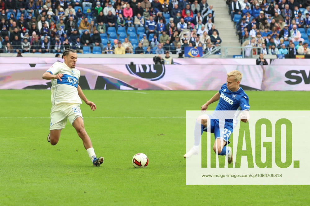 Fussball 2.Bundesliga, Karlsruher SC - SV Darmstadt 98 v.l. William Mikelbrencis (SV Darmstadt 98) Viktor Bergh (Karlsruher SC) Zweikampf, Aktion, action, battle for the ball Karlsruhe