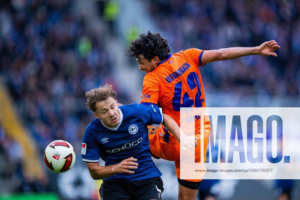 Fußball, 2026 2027, 2. Bundesliga, 8. Spieltag, DSC Arminia Bielefeld - VfL Osnabrück: (L-R) Felix Hagmann (Bielefeld), Jonathan Gomez (Osnabrück) DFL REGULATIONS PROHIBIT ANY USE OF PHOTOGRAPHS AS IMAGE SEQUENCES AND OR QUASI-VIDEO.