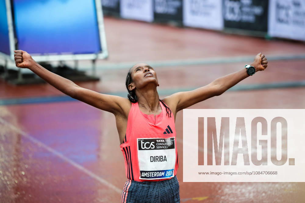 18th October 2026; Amsterdam, Netherlands; TCS Amsterdam Marathon; Buze Diriba of Ethiopia celebrates her victory in the finish area AnthonyxBenoit