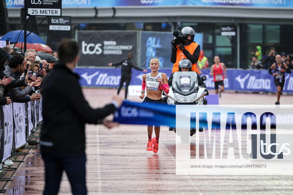 18th October 2026; Amsterdam, Netherlands; TCS Amsterdam Marathon; Mikky Keetels of the Netherlands crosses the finish line as the fastest Dutch woman, 14th, in a personal best time of 2:30:36 AnthonyxBenoit