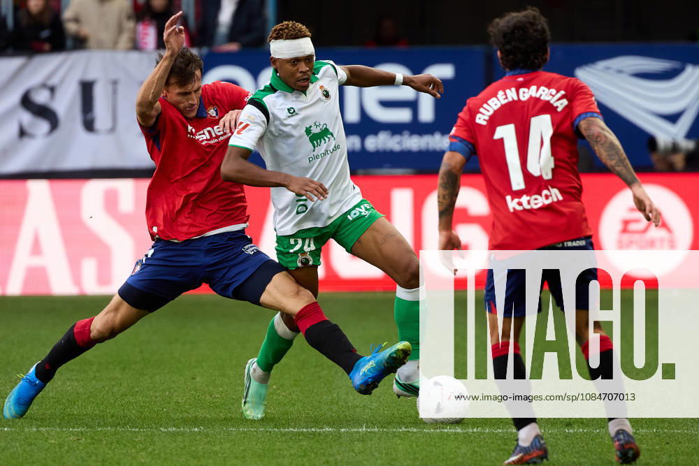 LaLiga EASports 2026 27 CA Osasuna v Racing de Santander Ante Budimir (17. OSA) (L) and Jeanuel Belocian (24. RAC) (R) battle for the ball during the football match of LaLiga EA Sports between CA Osasuna and Racing de Santander played at El Sadar stadium in Pamplona (Spain) on Oct 18 2026. Ruben Garcia (14. OSA) is also visible in the image. Credit: Inigo Alzugaray Agencia LOF Pamplona LaLiga EASports 2026 27 CA Osasuna v Racing de Santander