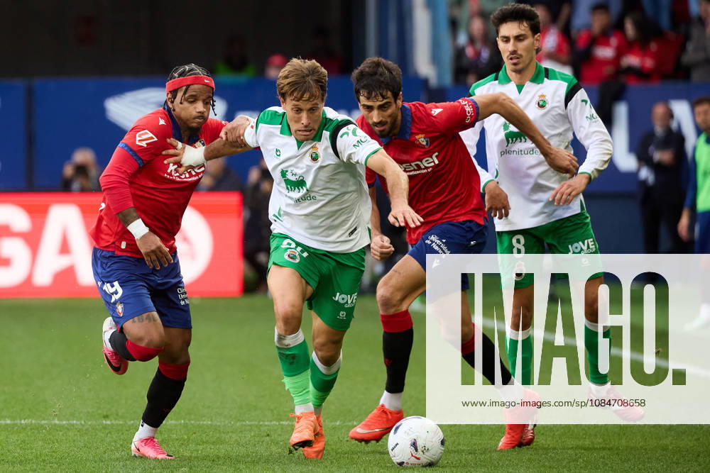 LaLiga EASports 2026 27 CA Osasuna v Racing de Santander Valentin Rosier (19. OSA) (L), Sergio Canales (20. RAC) and Alejandro Catena (24. OSA) (R) battle for the ball during the football match of LaLiga EA Sports between CA Osasuna and Racing de Santander played at El Sadar stadium in Pamplona (Spain) on Oct 18 2026. Andre Almeida (8. RAC) is also visible in the image. Credit: Inigo Alzugaray Agencia LOF Pamplona LaLiga EASports 2026 27 CA Osasuna v Racing de Santander