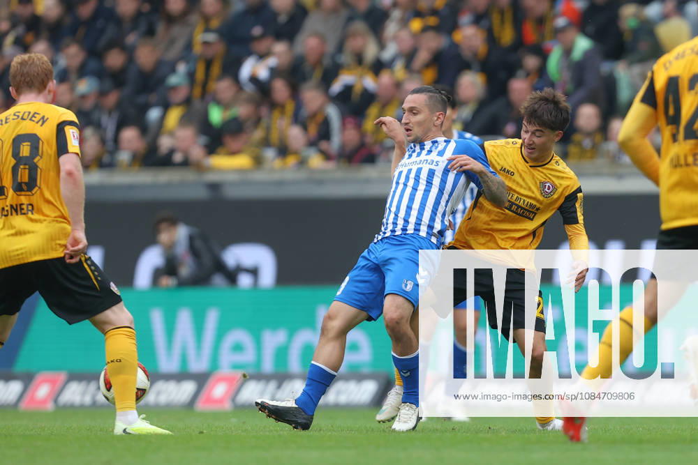 Fussball 2. Bundesliga, SG Dynamo Dresden - 1. FC Magdeburg, v.l. Baris Atik (Magdeburg, 23), Patrice Covic (Dresden, 24) Zweikampf, Duell, Kampf, tackle Dresden