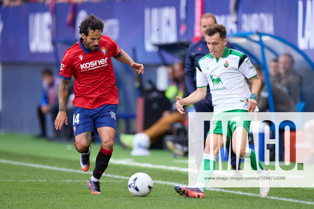 Ruben Garcia of CA Osasuna competes for the ball with Inigo Vicente of Real Racing Club de Santander during the LaLiga EA Sports match between CA Osasuna and Real Racing Club de Santander at El Sadar on October 18, 2026, in Pamplona, Spain. Pamplona SPAIN - ZUMAa181 20261018_zaa_a181_105