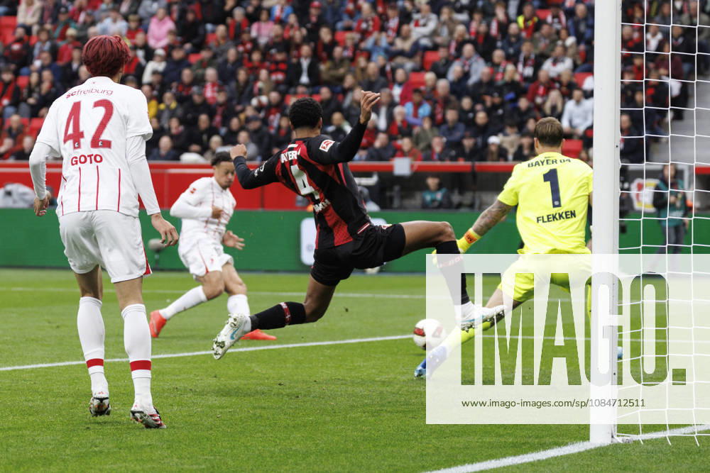 Derry Scherhant (SC Freiburg, 7) scores 0-1, Jarell Quansah (Bayer 04 Leverkusen, 4) and Mark Flekken (Bayer 04 Leverkusen, 1) can’t defend during the German Bundesliga match on gameday 6 between Bayer 04 Leverkusen vs. SC Freiburg at BayArena on October 18, 2026 in Leverkusen, Germany. DFL REGULATIONS PROHIBIT ANY USE OF PHOTOGRAPHS AS IMAGE SEQUENCES AND OR QUASI-VIDEO. Northrhine-Westphalia Germany