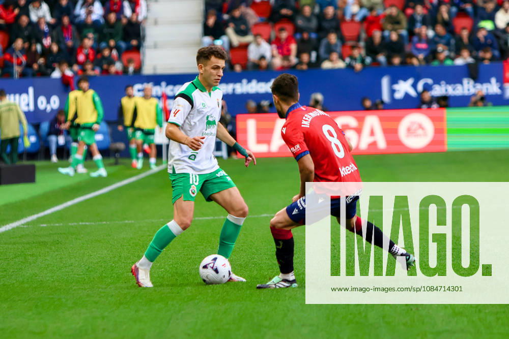 ESP: LaLiga EA Sports Atletico Osasuna v Racing Santander Inigo Vicente of Racing de Santander and Iker Munoz of Osasuna during LaLiga EA Sports match between Atletico Osasuna v Racing Santander played at El Sadar Stadium, Pamplona, on October 18 2026 in Spain Spain Soccer