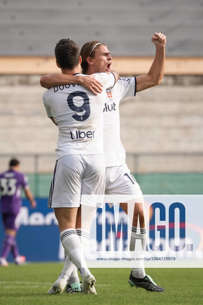 Como’s Tasos Douvikas celebrates with Como’s Nico Paz after scoring the 1-3 goal for his team during the Serie A soccer match between Fiorentina and Como at the Artemio Franchi Stadium in Florence, north Italy - Sunday, October 18, 2026 -
