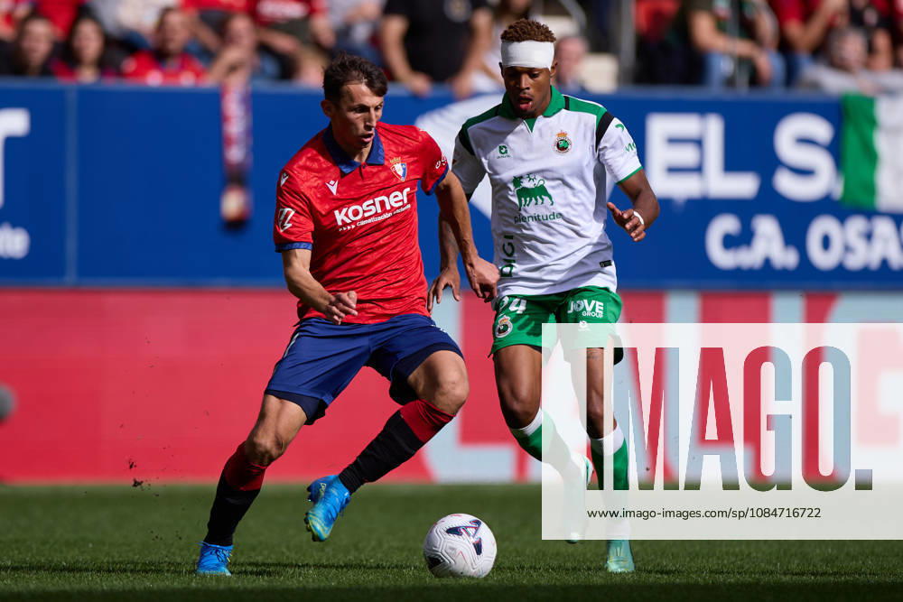 Ante Budimir of CA Osasuna competes for the ball with Jeanuel Belocian of Real Racing Club de Santander during the LaLiga EA Sports match between CA Osasuna and Real Racing Club de Santander at El Sadar on October 18, 2026, in Pamplona, Spain. Pamplona SPAIN - ZUMAa181 20261018_zaa_a181_125