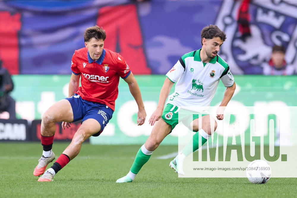 Abel Bretones of CA Osasuna competes for the ball with Andres Martin of Real Racing Club de Santander during the LaLiga EA Sports match between CA Osasuna and Real Racing Club de Santander at El Sadar on October 18, 2026, in Pamplona, Spain. Pamplona SPAIN - ZUMAa181 20261018_zaa_a181_131
